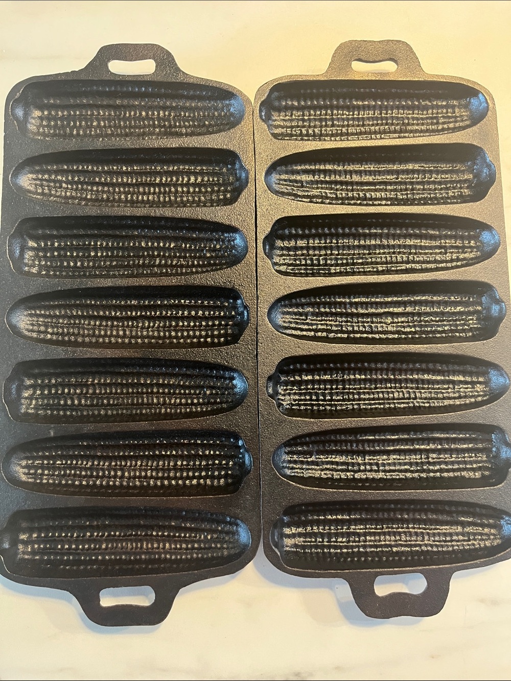 2 Antique 7 stick corn pans